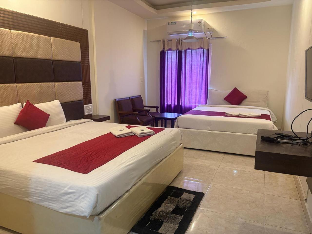 Hotel New Rajdarshan Мадикери Экстерьер фото