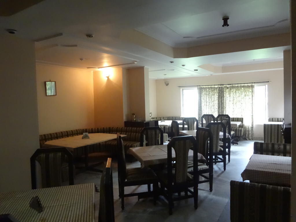 Hotel New Rajdarshan Мадикери Экстерьер фото